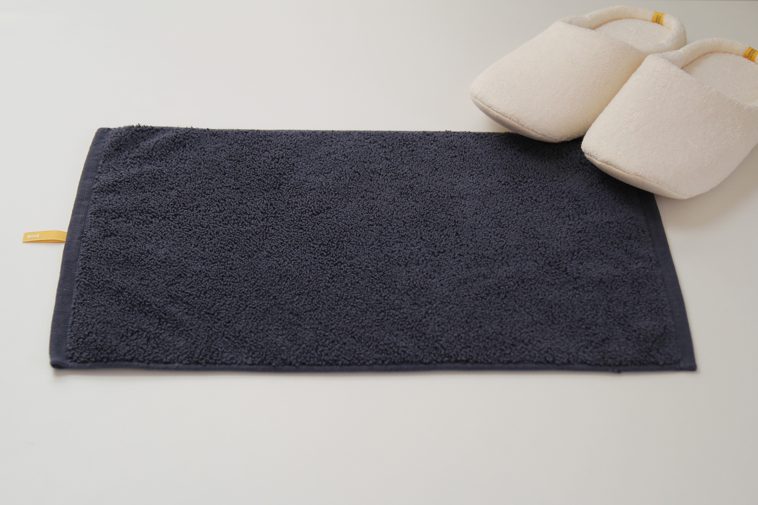 Bath mats specially designed for one person are now on sale to “make your home washroom look like a hotel.